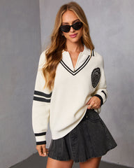 Jiles Embroidered Crest Partial Zip Sweater